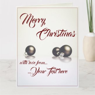 Three christmas balls in front of light background card