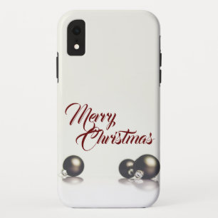 Three christmas balls in front of light background iPhone XR case