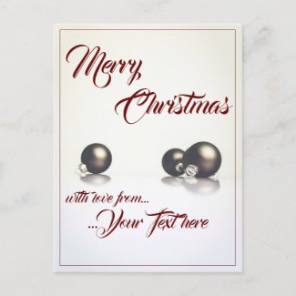 Three christmas balls in front of light background holiday postcard