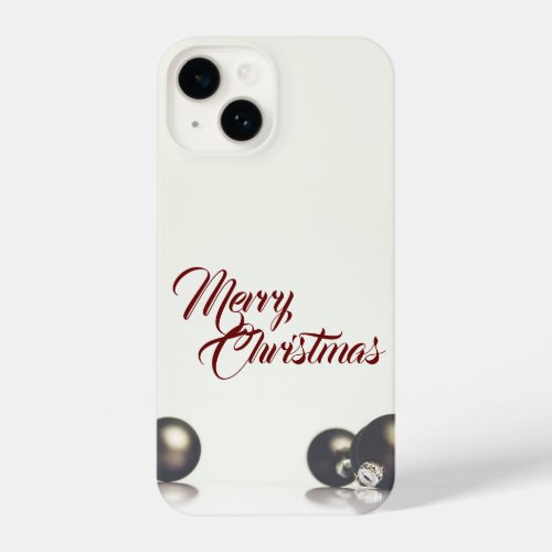 Three christmas balls in front of light background iPhone 14 case