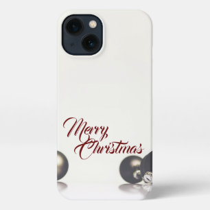 Three christmas balls in front of light background iPhone 13 case