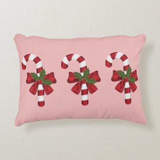 Three Christmas Candy Canes On Light Pink Accent Pillow