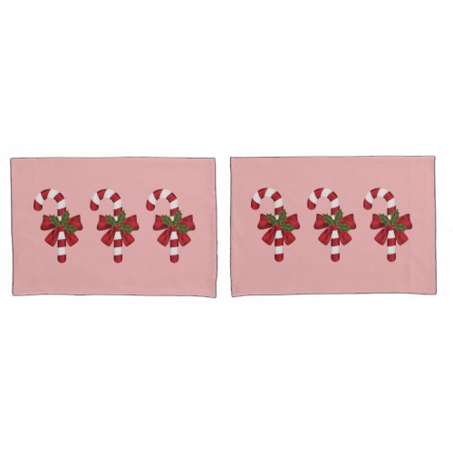 Three Christmas Candy Canes On Light Pink Pillow Case