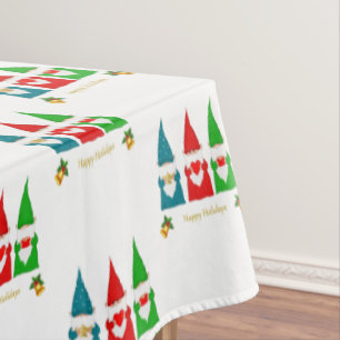 Three Colorfu Christmas Gnomes on White Tablecloth
