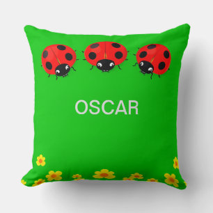 Three Colorful Ladybugs on Green Background Throw Pillow