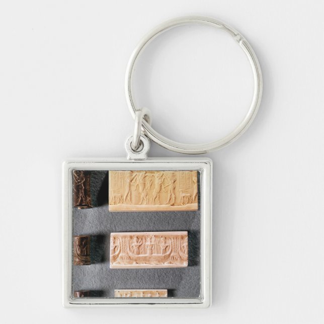 Three cylinder seals with impressions, keychain (Front)