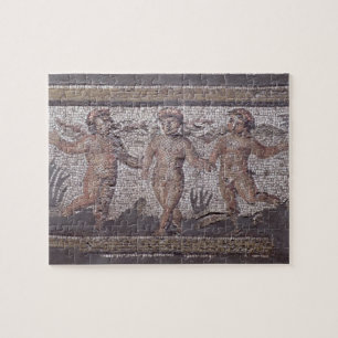 Three dancing putti accompanied by one playing the jigsaw puzzle