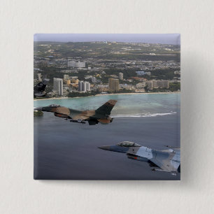 Three F-16 Fighting Falcons fly in formation Button