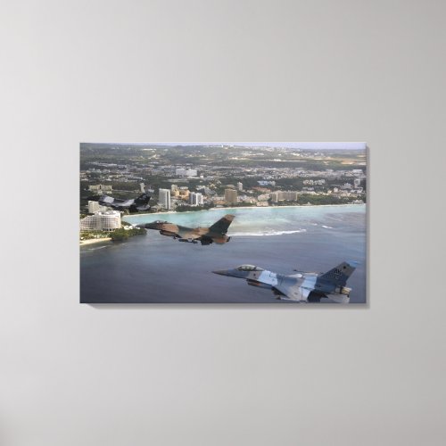 Three F_16 Fighting Falcons fly in formation Canvas Print