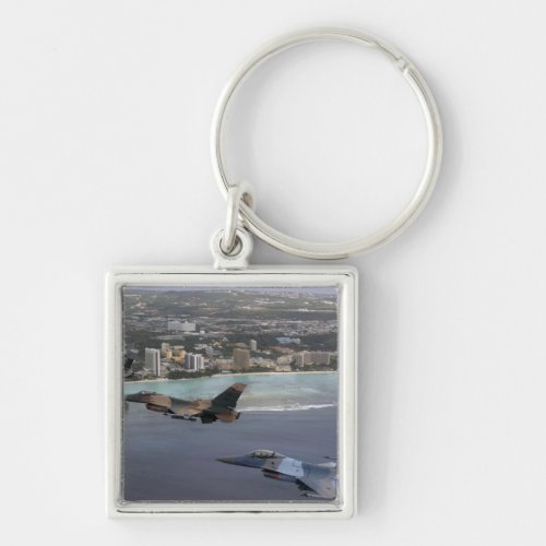 Three F_16 Fighting Falcons fly in formation Keychain