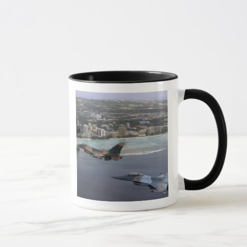 Three F_16 Fighting Falcons fly in formation Mug