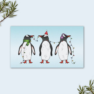 Three Festive Christmas Penguins On Light Blue Business Card