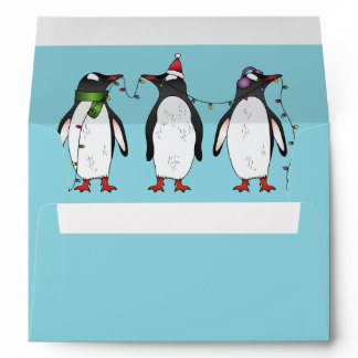 Three Festive Christmas Penguins On Light Blue Envelope