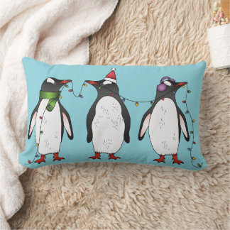 Three Festive Christmas Penguins On Light Blue Lumbar Pillow