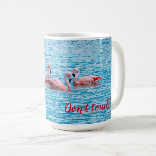 Three flamingos on the Laguna Amarga Coffee Mug