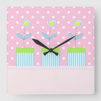 Three flowers on pink with white dots square clock