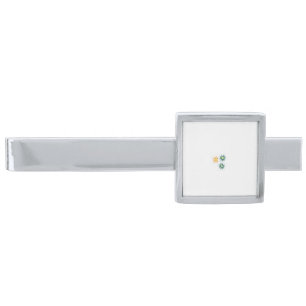 three flowers with green and orange petals silver finish tie bar