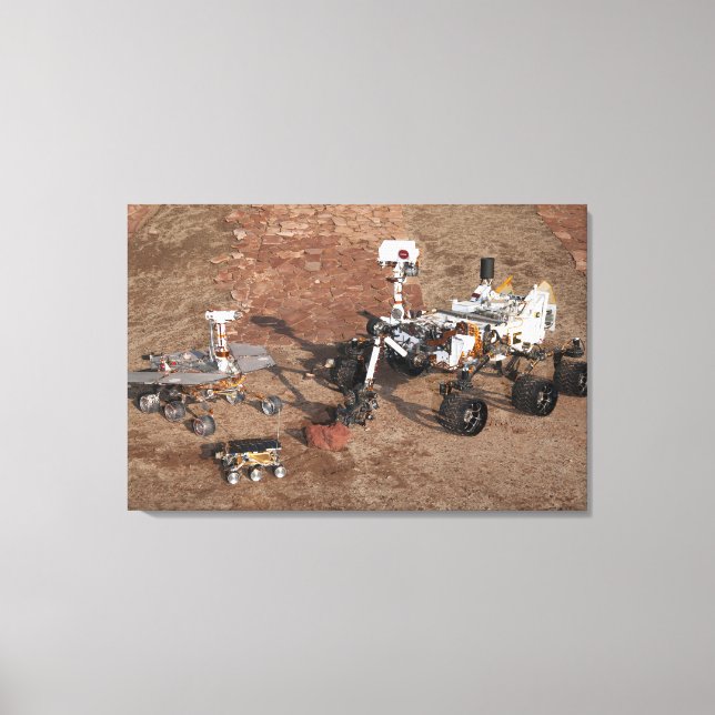 Three Generations Of Mars Rovers. Canvas Print (Front)