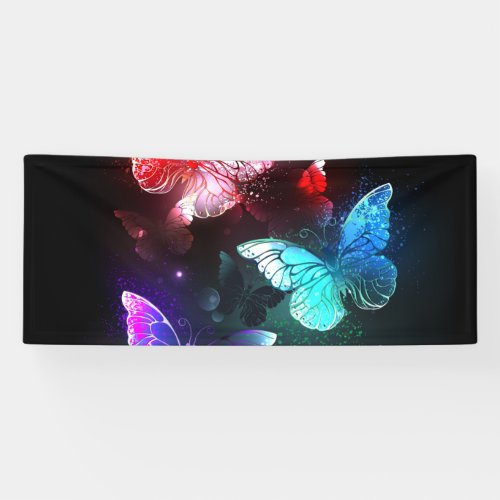 Three Glowing Butterflies on night background Banner