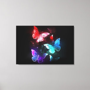 Three Glowing Butterflies on night background Canvas Print