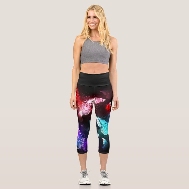Three Glowing Butterflies on night background Capri Leggings (Front)