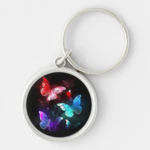 Three Glowing Butterflies on night background Keychain