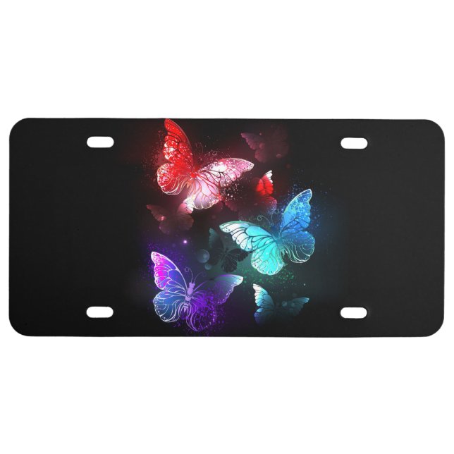 Three Glowing Butterflies on night background License Plate (Front)