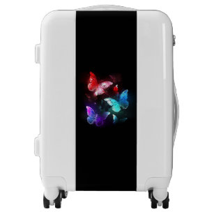 Three Glowing Butterflies on night background Luggage