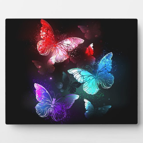 Three Glowing Butterflies on night background Plaque