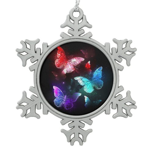 Three Glowing Butterflies on night background Snowflake Pewter Christmas Ornament