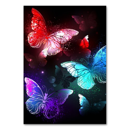 Three Glowing Butterflies on night background Table Number