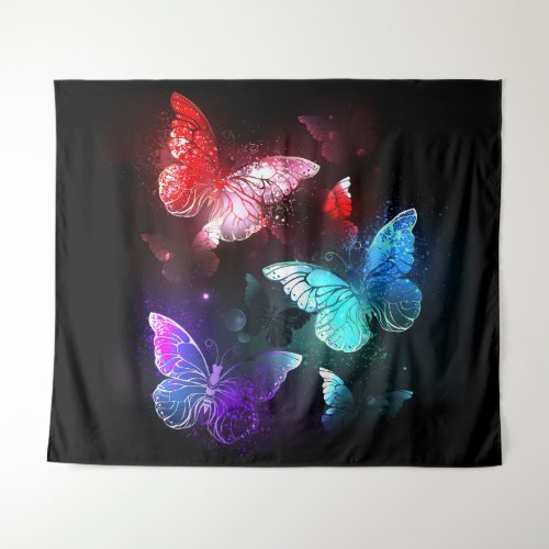 Three Glowing Butterflies on night background Tapestry