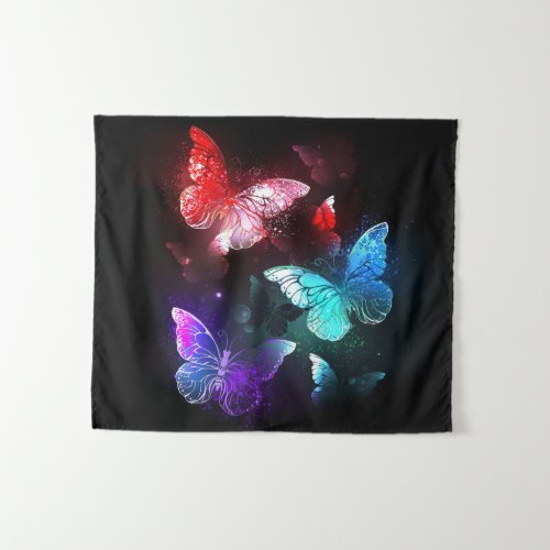 Three Glowing Butterflies on night background Tapestry