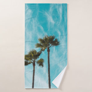 Three green leaf trees below cirus clouds bath towel