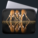 Three Impala Drink Together at Night Laptop Sleeve<br><div class="desc">Africa,  East Africa,  Kenya,  Great Rift Valley,  Olkirimatian Conservancy,  impala,  Aepyceros melampus.  Three impala drink together at night.</div>