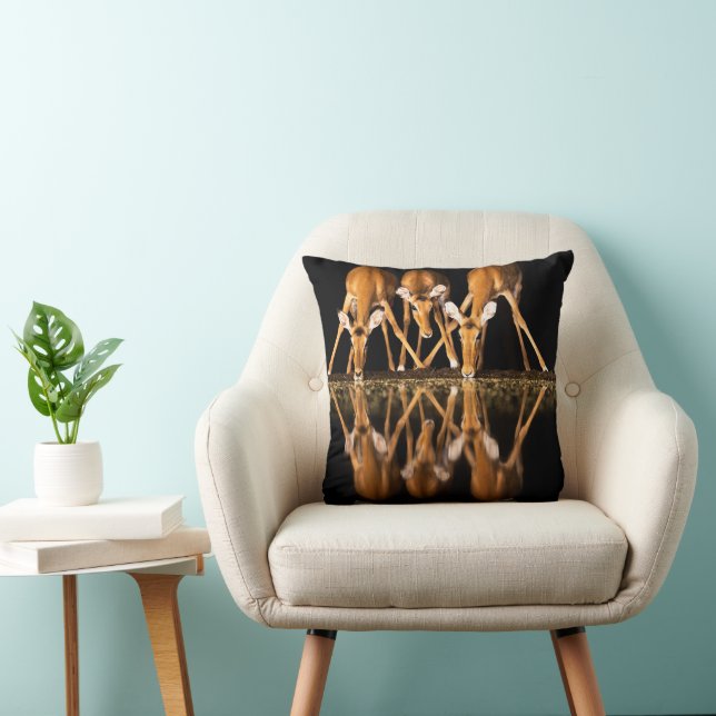 Three Impala Drink Together at Night Throw Pillow (Chair)