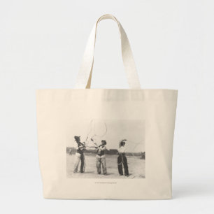 Three men lassoing. large tote bag