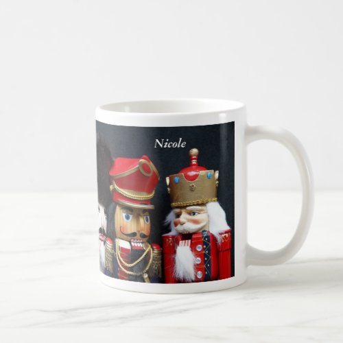 Three nutcrackers on black mug