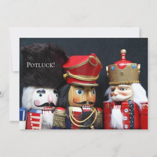 Three nutcrackers on dark background invitation