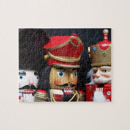 Three nutcrackers on dark background jigsaw puzzle