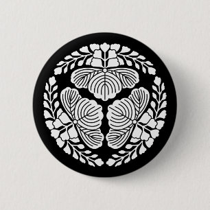 Three paulownia blooms, heads facing outward button