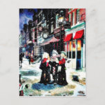 Three Persons Standing On A Street Singing Christm Holiday Postcard at Zazzle