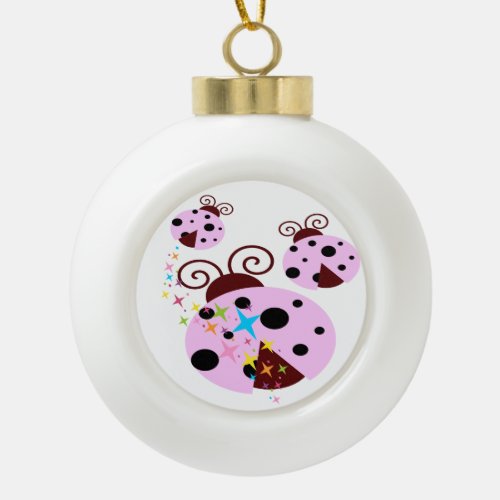 Three pink and black ladybug with stars ceramic ball christmas ornament