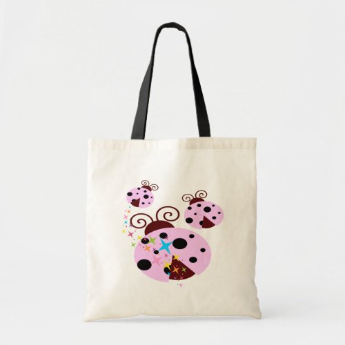 Three pink and black ladybug with stars tote bag