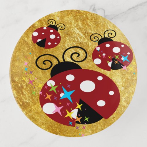 Three red and black ladybug stars and gold foil trinket tray