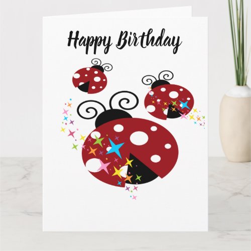 Three red and black ladybug with stars card