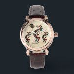 Three Southwest Kokopelli Watch<br><div class="desc">This is a Unique "One of a Kind" Southwest Kokopelli Watch! It Features Three Southwest Kokopelli in Turquoise, Orange and Black Dancing and Playing the Flute Under the Sun on a Tan Sandstone Background!
Original Art Design By Artist Kerry Miller.</div>