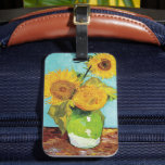 Three Sunflowers | Vincent van Gogh Luggage Tag<br><div class="desc">Three Sunflowers (1888) by Vincent van Gogh is a vibrant still life that showcases the artist’s signature thick brushstrokes and bold use of color. The painting features three sunflowers in a simple vase, their golden petals contrasting against the aqua blue background. Van Gogh's vivid yellow palette brings energy and life...</div>