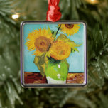 Three Sunflowers | Vincent van Gogh Metal Ornament<br><div class="desc">Three Sunflowers (1888) by Vincent van Gogh is a vibrant still life that showcases the artist’s signature thick brushstrokes and bold use of color. The painting features three sunflowers in a simple vase, their golden petals contrasting against the aqua blue background. Van Gogh's vivid yellow palette brings energy and life...</div>