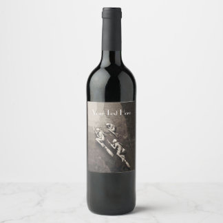 Three White Witches flying on Brooms on Browns Wine Label